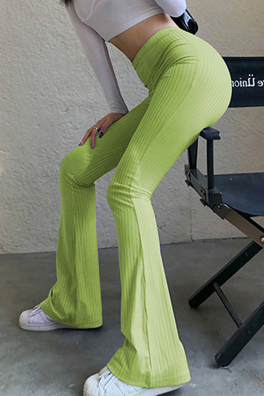 Pantalones casuales sencillos de color liso con cintura alta y botones.