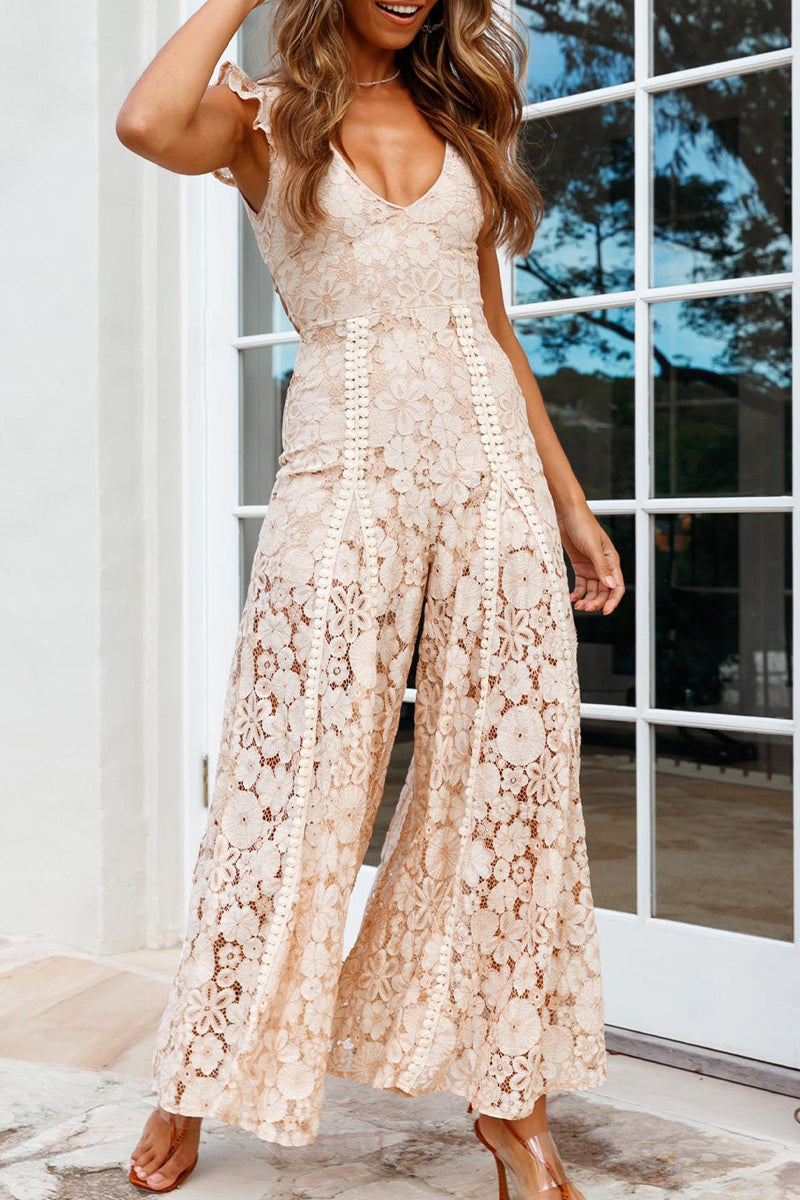 Mono elegante con escote en V, espalda descubierta y bordado sólido