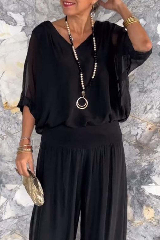 Elegante conjunto de dos piezas con cuello en V, media manga y patchwork liso