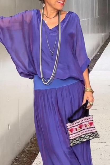 Elegante conjunto de dos piezas con cuello en V, media manga y patchwork liso