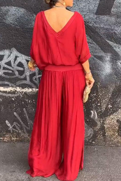 Elegante conjunto de dos piezas con cuello en V, media manga y patchwork liso