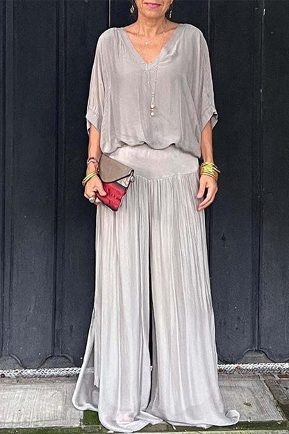 Elegante conjunto de dos piezas con cuello en V, media manga y patchwork liso