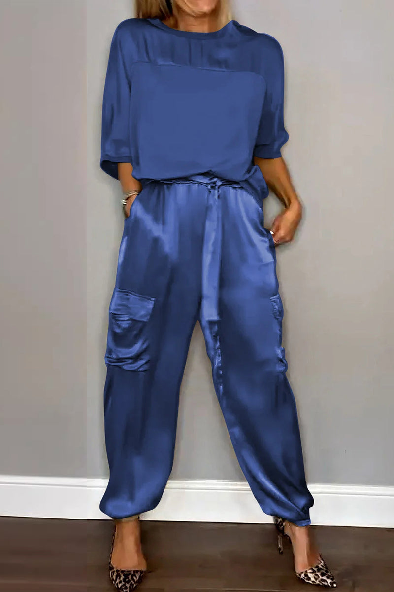 Conjunto informal de dos piezas con cuello redondo, manga corta y bolsillos sólidos