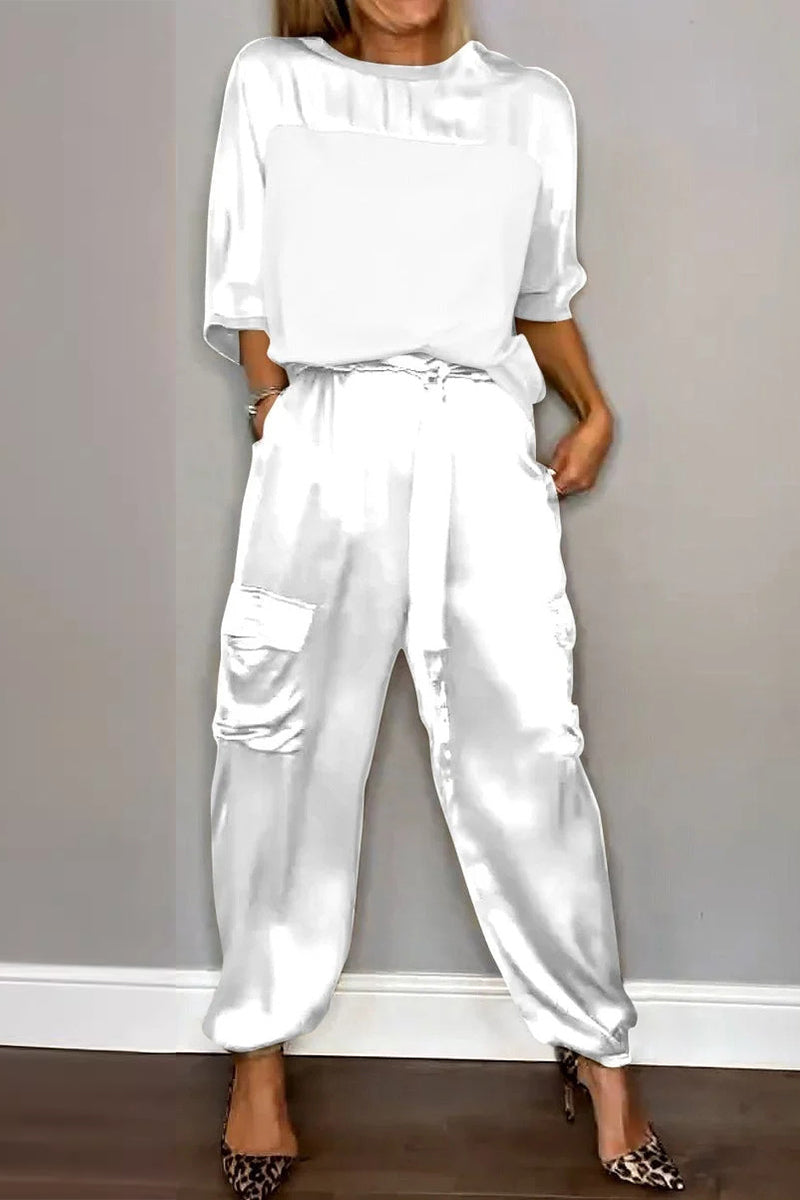 Conjunto informal de dos piezas con cuello redondo, manga corta y bolsillos sólidos