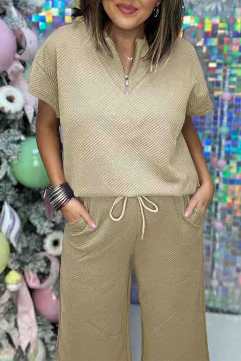 Conjunto informal sencillo de dos piezas con cremallera, cuello vuelto, manga corta y bolsillos sólidos