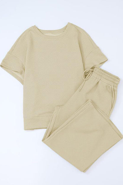 Conjunto informal sencillo de dos piezas con bolsillos lisos, cuello redondo, manga corta (13 colores)