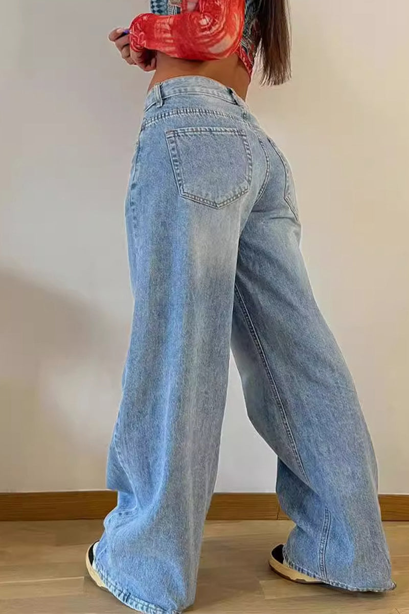 Vaqueros holgados de cintura alta con bolsillos viejos y estilo informal de calle