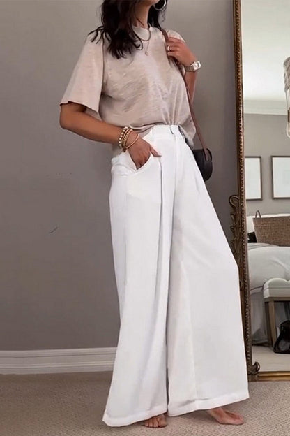 Conjunto informal de dos piezas con cuello redondo, manga corta y bolsillos sólidos
