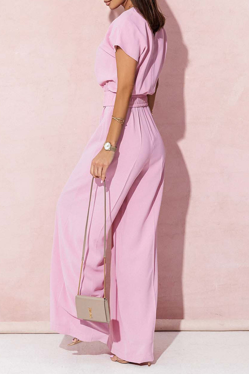 Monos holgados informales con cuello en V y accesorios de metal sólido