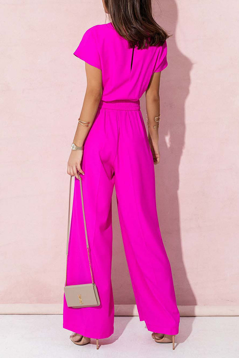 Monos holgados informales con cuello en V y accesorios de metal sólido