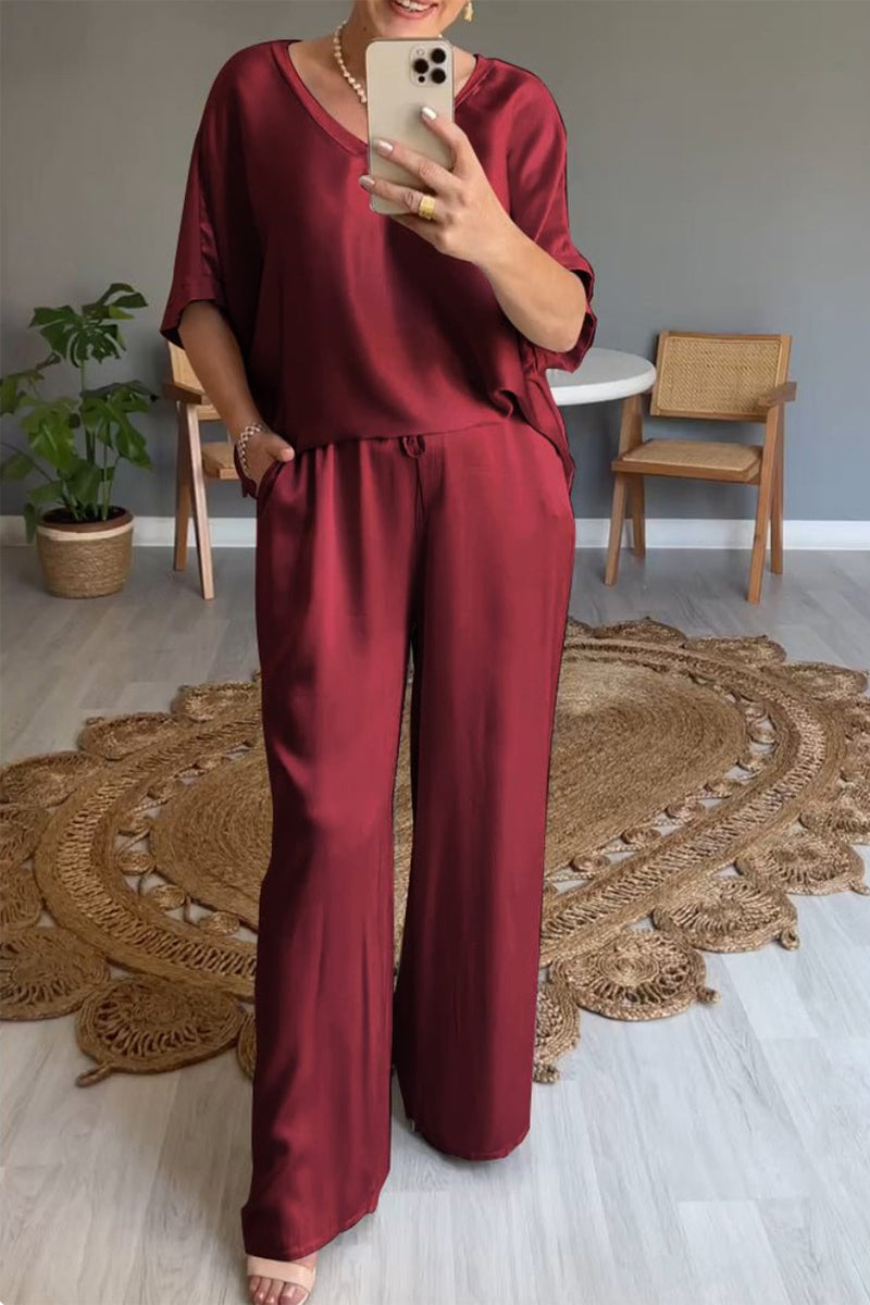 Conjunto de dos piezas informal sencillo con cuello en V, manga corta y bolsillos sólidos