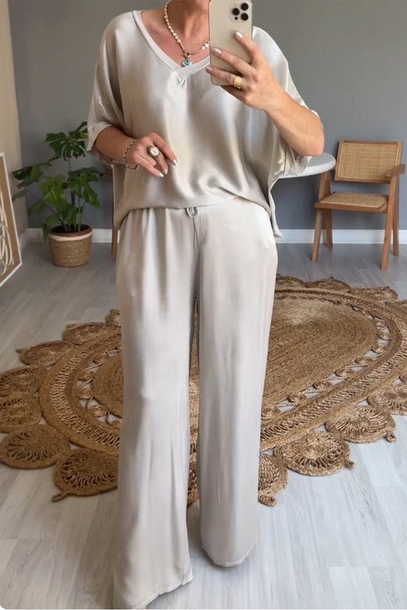 Conjunto de dos piezas informal sencillo con cuello en V, manga corta y bolsillos sólidos
