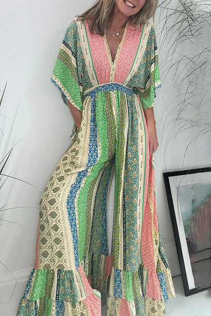 Mono holgado elegante con estampado geométrico, bolsillo, frenillo, espalda descubierta y cuello en V