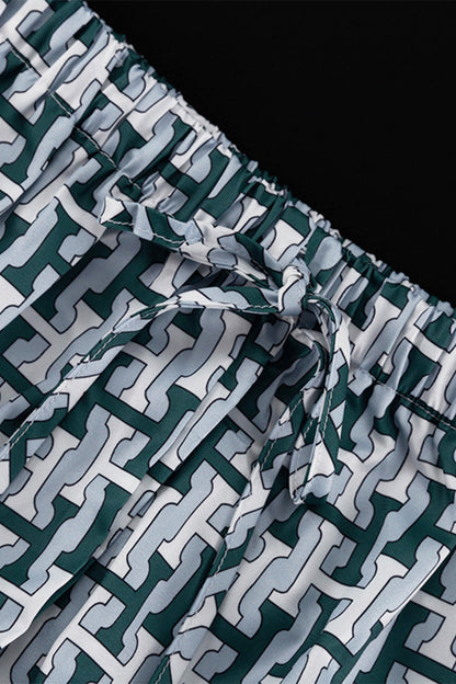 Conjunto informal de dos piezas con cuello vuelto, manga larga y estampado geométrico diario en contraste