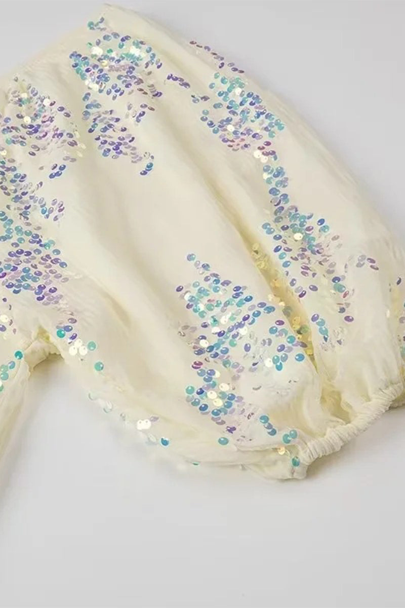 Vestidos de celebridades sexys con lentejuelas y escote en V y falda de un solo paso