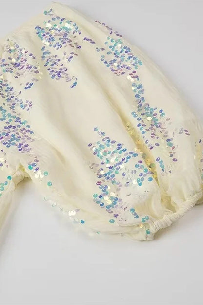 Vestidos de celebridades sexys con lentejuelas y escote en V y falda de un solo paso