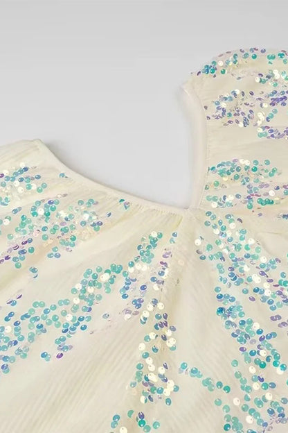 Vestidos de celebridades sexys con lentejuelas y escote en V y falda de un solo paso