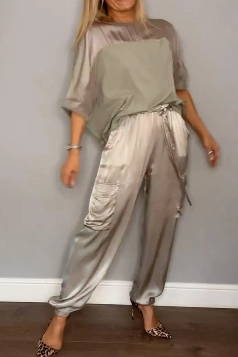 Conjunto informal de dos piezas con cuello redondo, manga corta y bolsillos sólidos