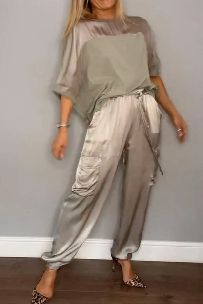 Conjunto informal de dos piezas con cuello redondo, manga corta y bolsillos sólidos