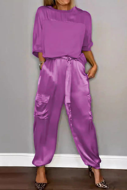 Conjunto informal de dos piezas con cuello redondo, manga corta y bolsillos sólidos
