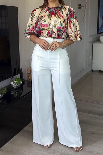 Elegante conjunto de dos piezas con estampado floral, bolsillo, cuello redondo y manga corta