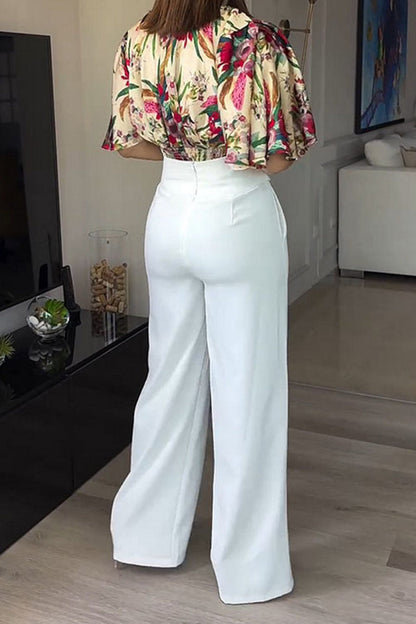 Elegante conjunto de dos piezas con estampado floral, bolsillo, cuello redondo y manga corta