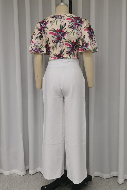 Elegante conjunto de dos piezas con estampado floral, bolsillo, cuello redondo y manga corta