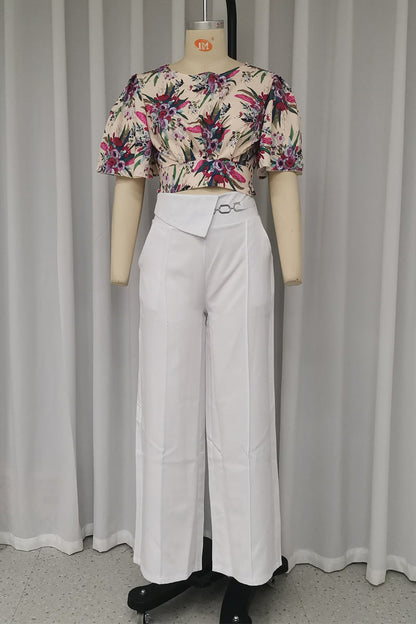 Elegante conjunto de dos piezas con estampado floral, bolsillo, cuello redondo y manga corta