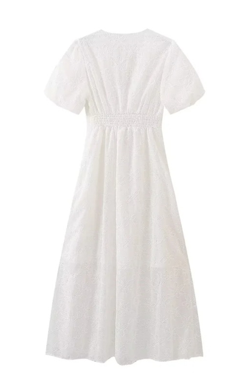 Elegante vestido de manga corta con escote en V y bordado en color liso