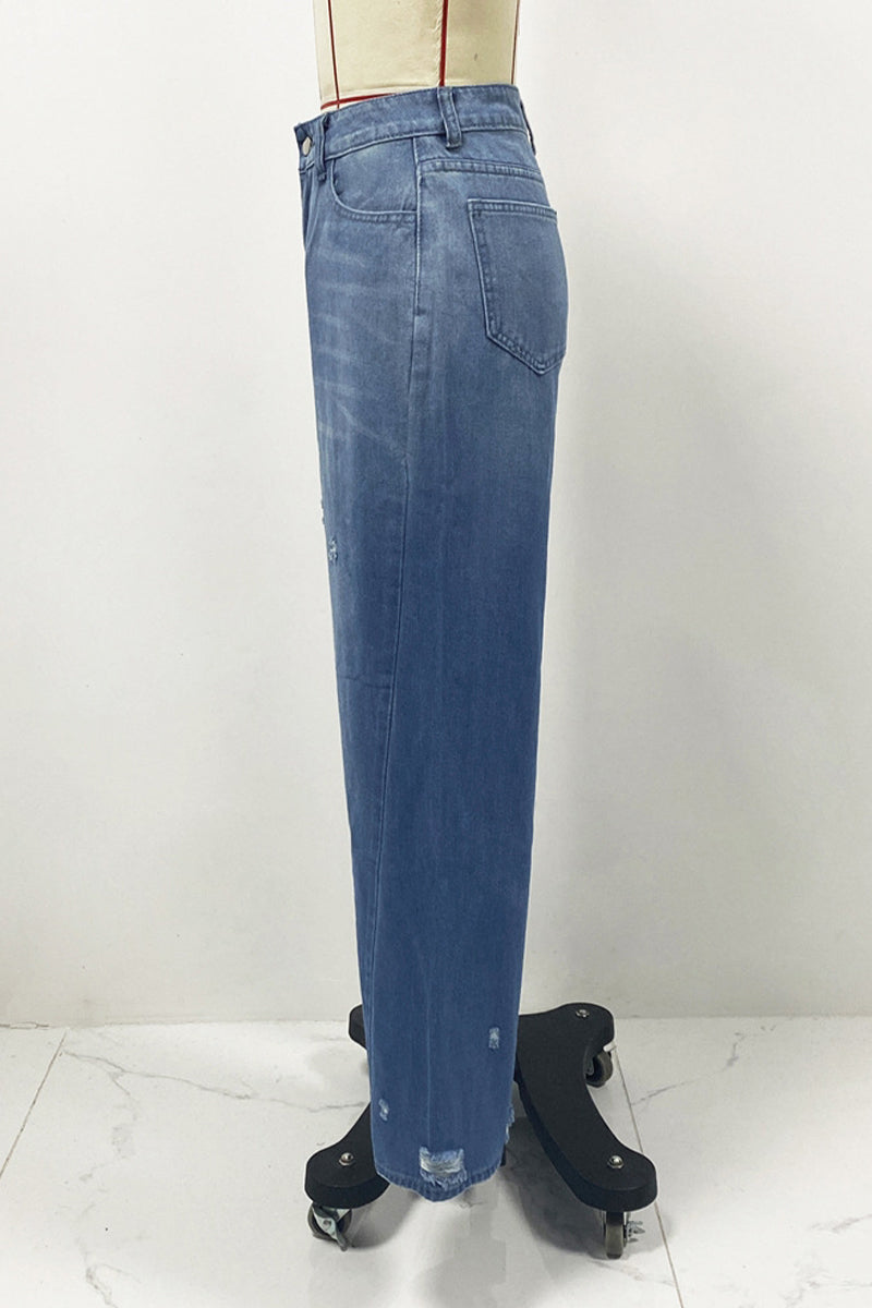 Vaqueros holgados de cintura alta con bolsillos rotos y degradado de color para uso informal en la calle