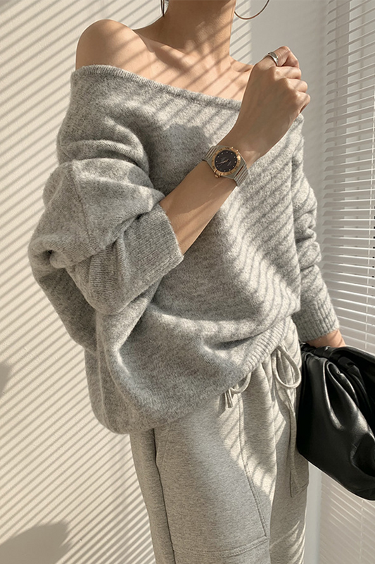 Suéteres sexys con cuello oblicuo irregular (3 colores)