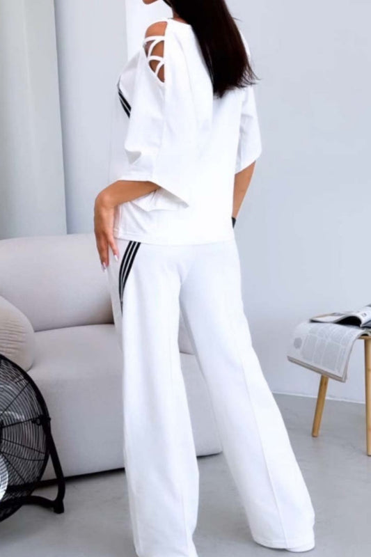 Conjunto de dos piezas con cuello oblicuo, media manga y estampado de rayas