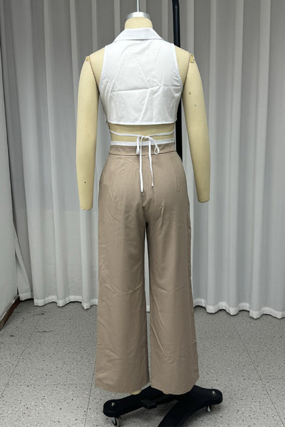 Conjunto informal de dos piezas con cordones, botones y cuello vuelto, sin mangas