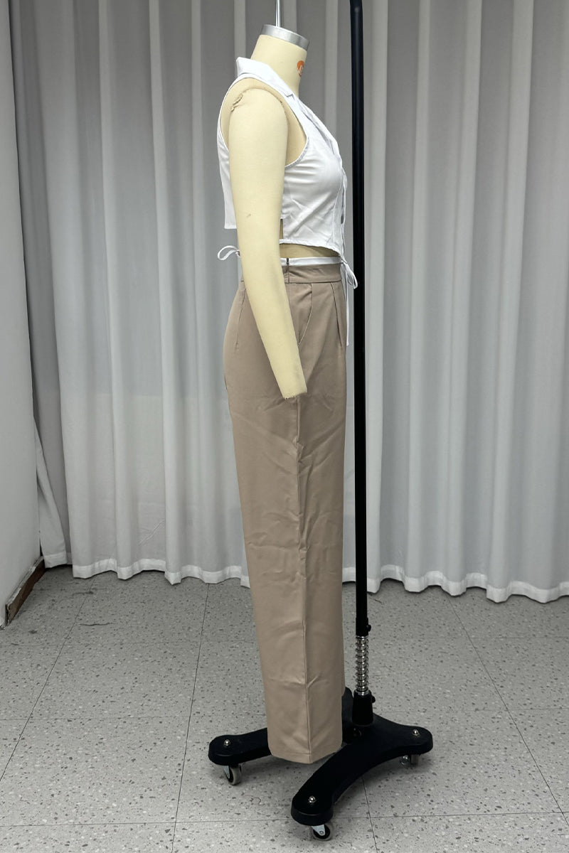 Conjunto informal de dos piezas con cordones, botones y cuello vuelto, sin mangas