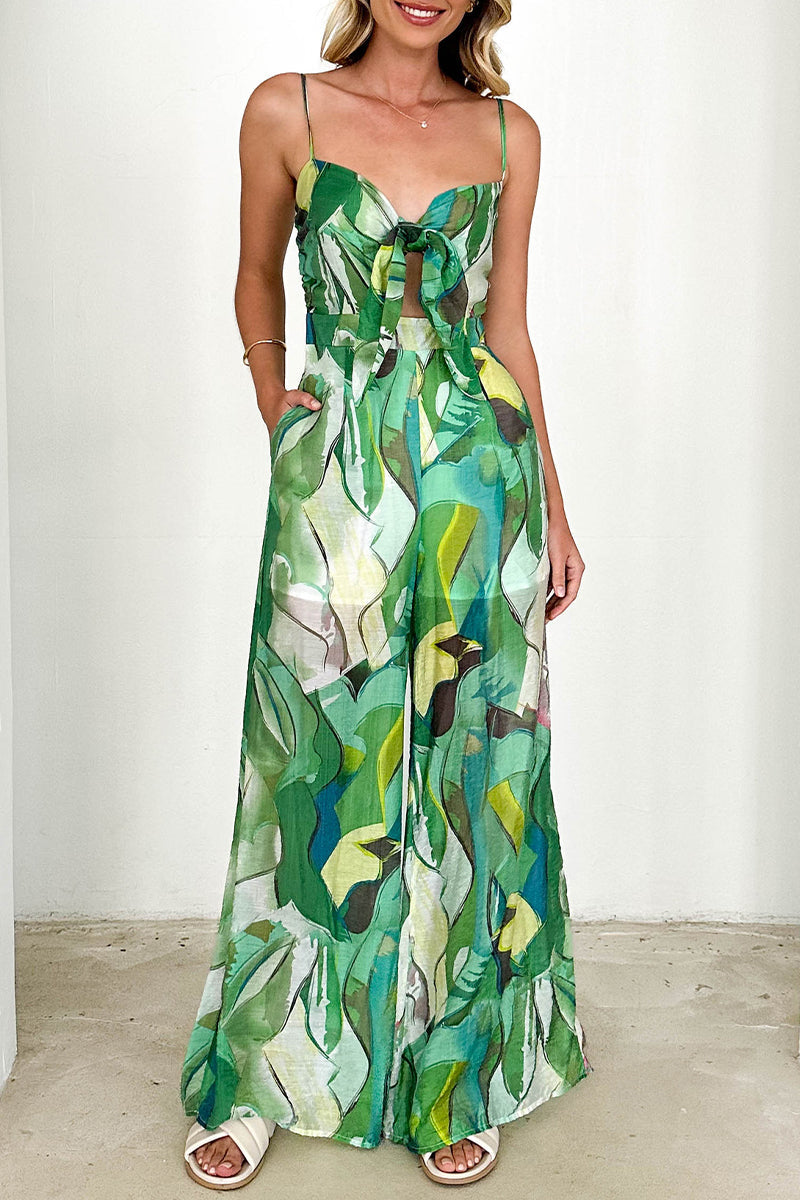 Mono holgado informal con cuello en V en contraste y bolsillos con estampado floral