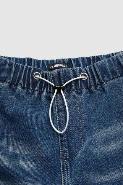 Vaqueros holgados de cintura media con fruncido y cordón desgastado