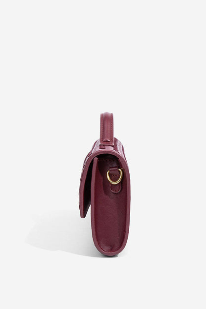 Bolso de mano de noche con diseño tejido