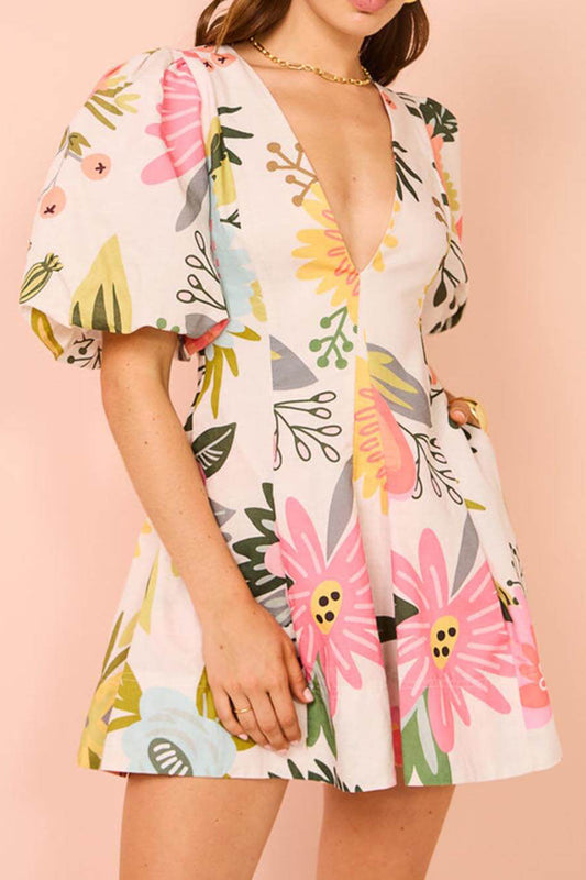 Minivestido con bolsillos, mangas abullonadas y estampado floral