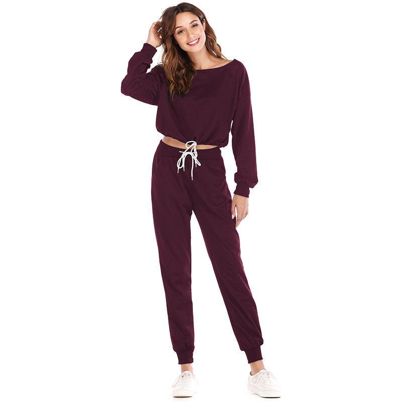 Conjunto de dos piezas de top de manga larga con cordón y pantalones casuales de color liso con cuello redondo tallas S-XL