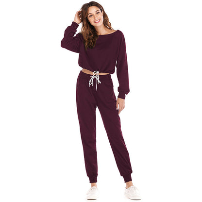 Conjunto de dos piezas de top de manga larga con cordón y pantalones casuales de color liso con cuello redondo tallas S-XL