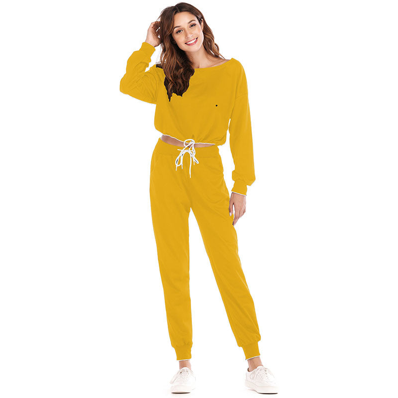 Conjunto de dos piezas de top de manga larga con cordón y pantalones casuales de color liso con cuello redondo tallas S-XL