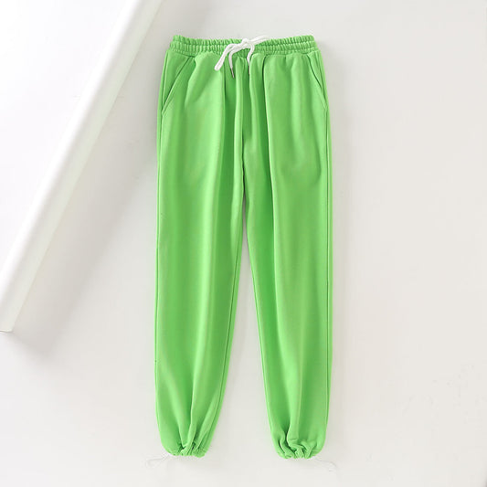 Pantalones deportivos casuales de cintura elástica de color sólido a la moda para mujer SL
