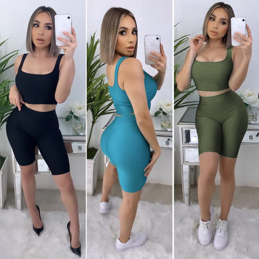 Conjuntos de dos piezas de camiseta sin mangas y pantalones cortos ajustados de color liso informales deportivos para mujer tallas S-XL