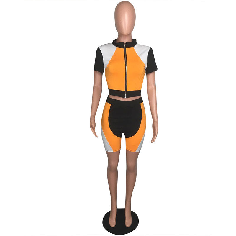 Conjuntos de dos piezas de top de manga corta y pantalones cortos ajustados con cremallera en contraste de color, tallas S-XXL