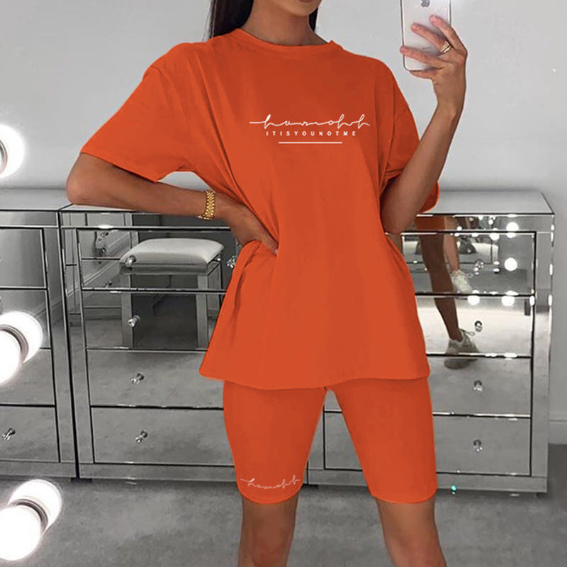 Conjunto de dos piezas de camiseta holgada de manga corta con estampado de letras y pantalones cortos ajustados para mujer de SL