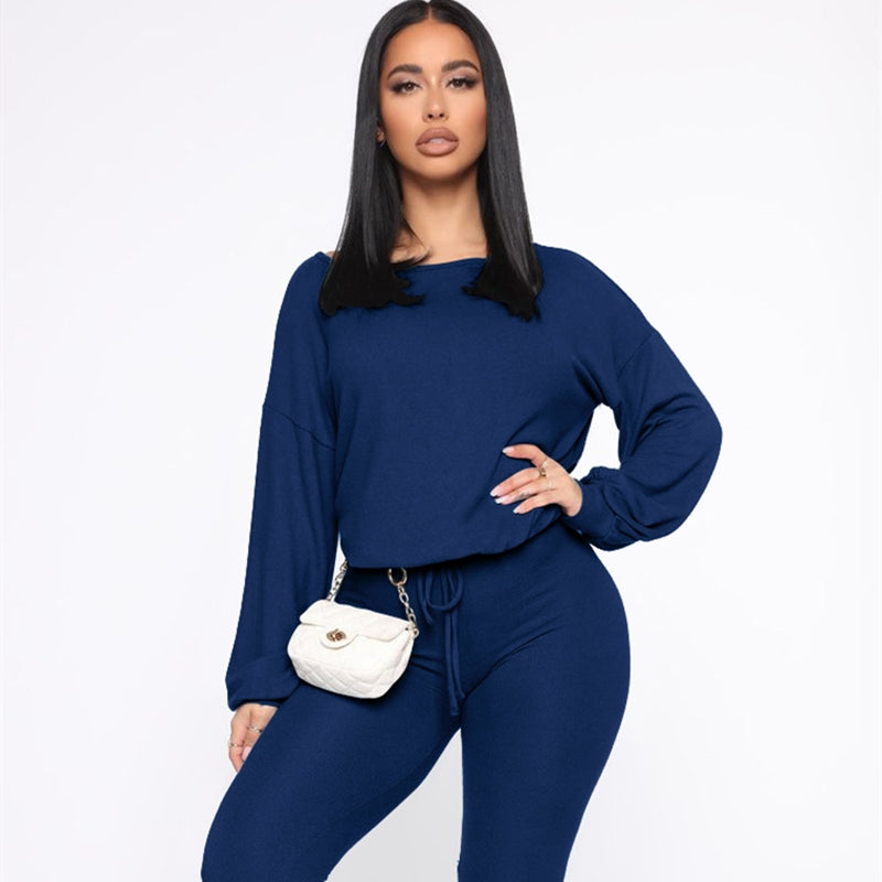 Conjunto de dos piezas de top y pantalón holgados de cuello redondo de color liso para mujer tallas S-XL