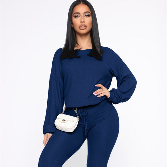 Conjunto de dos piezas de top y pantalón holgados de cuello redondo de color liso para mujer tallas S-XL
