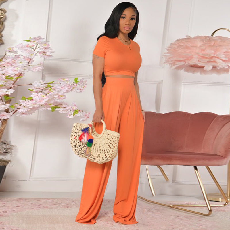 Conjunto de dos piezas de top corto y pantalón de color liso, manga corta, color naranja, informal y vanguardista para mujer