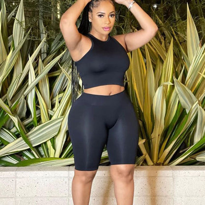 Conjunto deportivo de dos piezas para mujer, de verano, con camiseta sin mangas y pantalones cortos de color liso