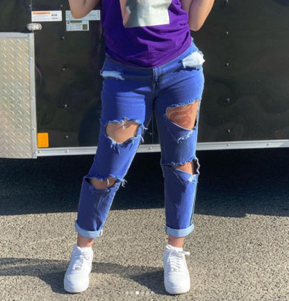 Vaqueros rasgados con corte elástico alto de color liso para mujer